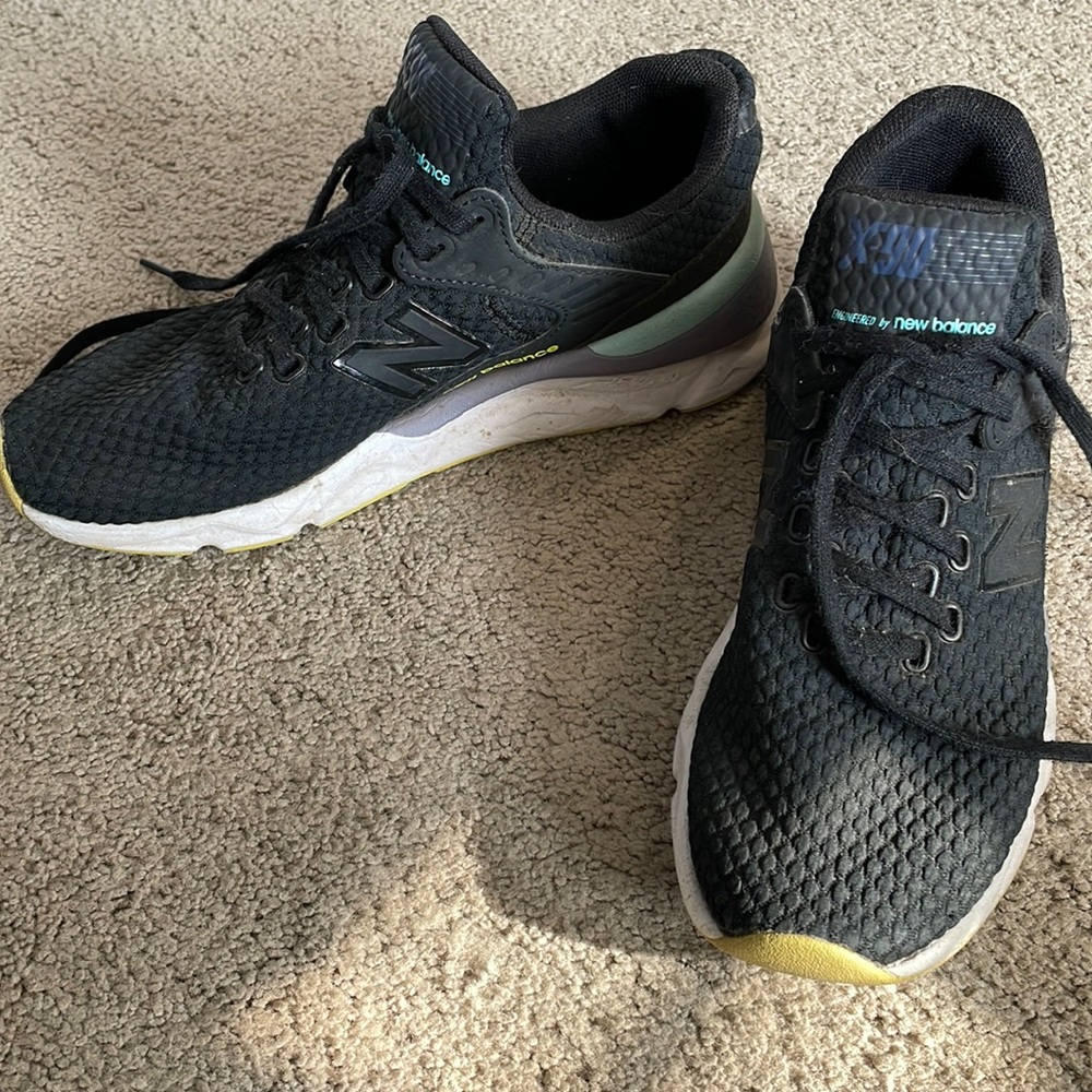 Black X90 New Balance. Worn a handful of times. Fit more on the narrow side.